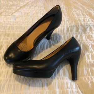 Black leather platform pumps